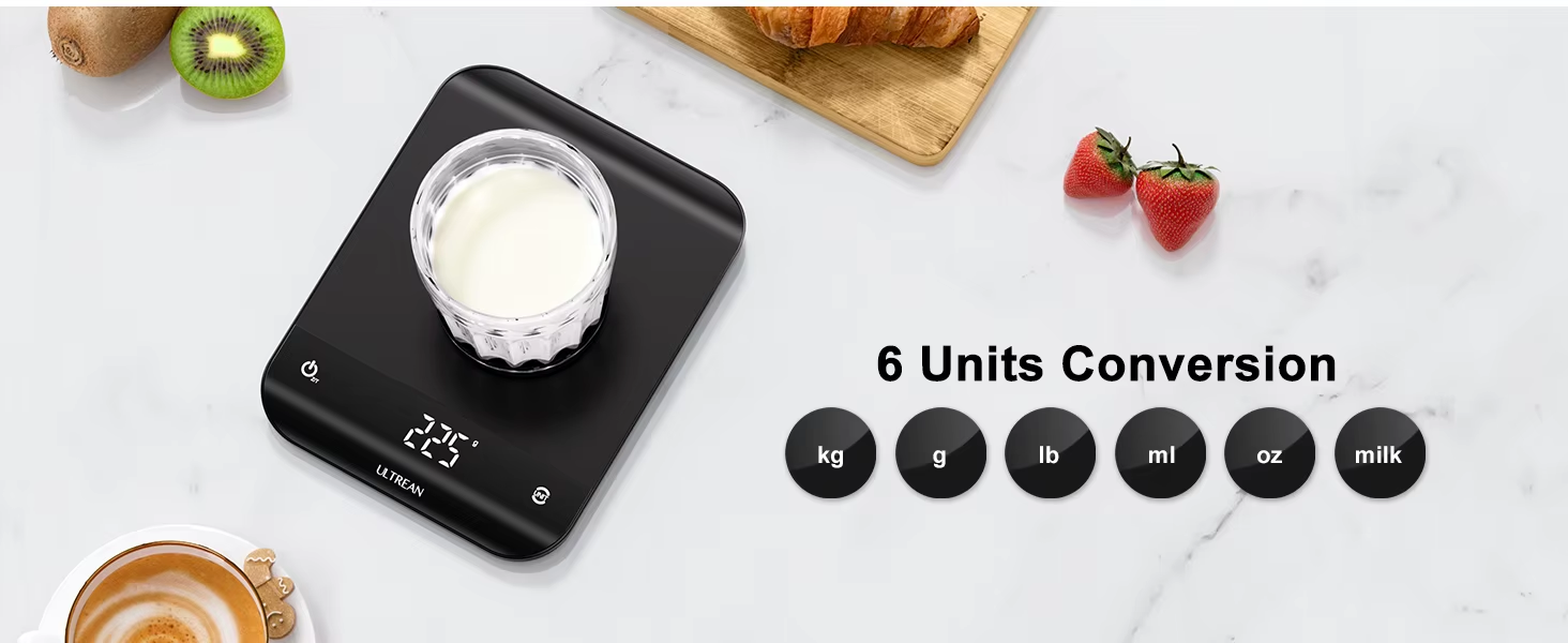 A black digital kitchen scale with gram precision displaying 6 unit conversion options on a marble countertop.